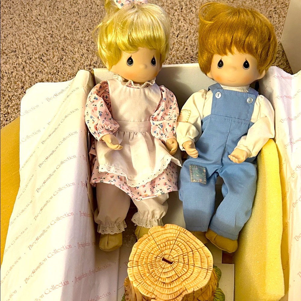 Precious Moments “love one another” by Enesco are well kept comes with stand